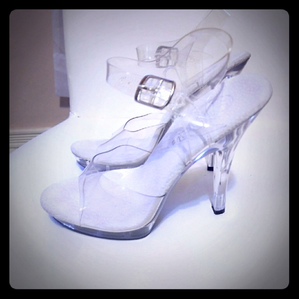 Pleaser Clear heels size 5,like new.